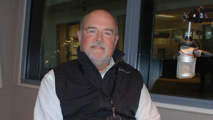 Color photograph of Ashton Nichols in a black vest.